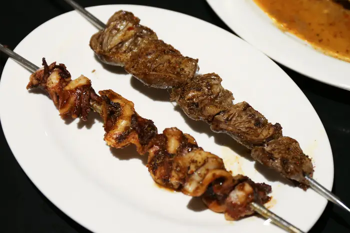 Spicy Cumin Barbecued Squid ($2) and Chicken Heart ($1.50) Skewers<br/>